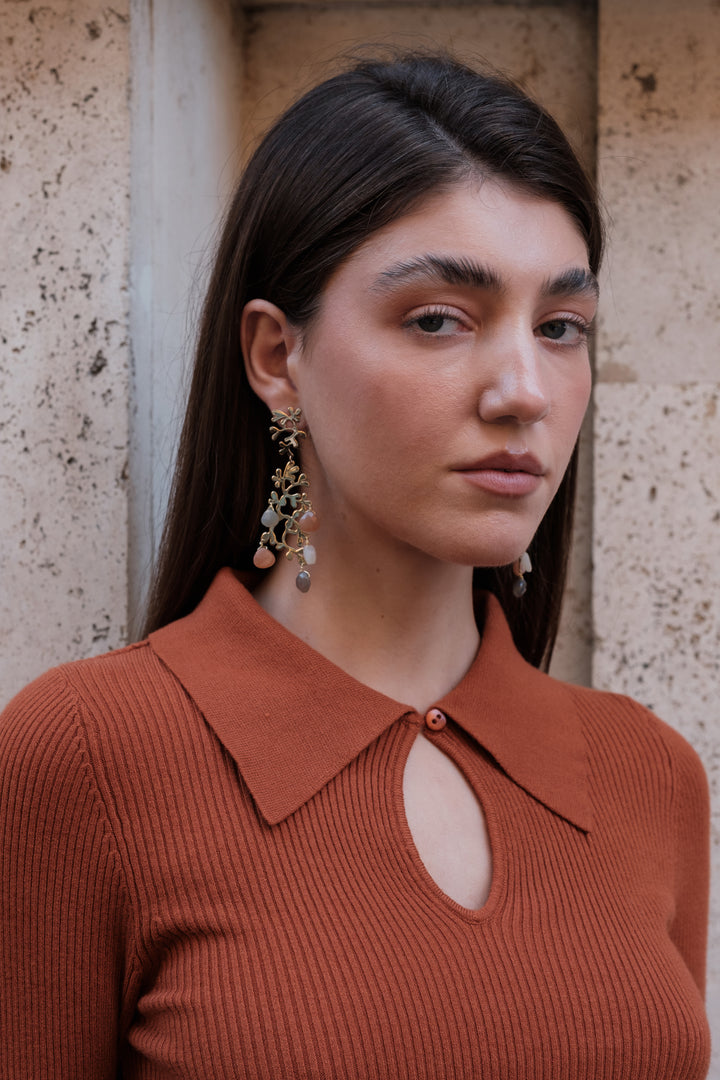 Polo donna in viscosa con scollo ovale e bottoncino
