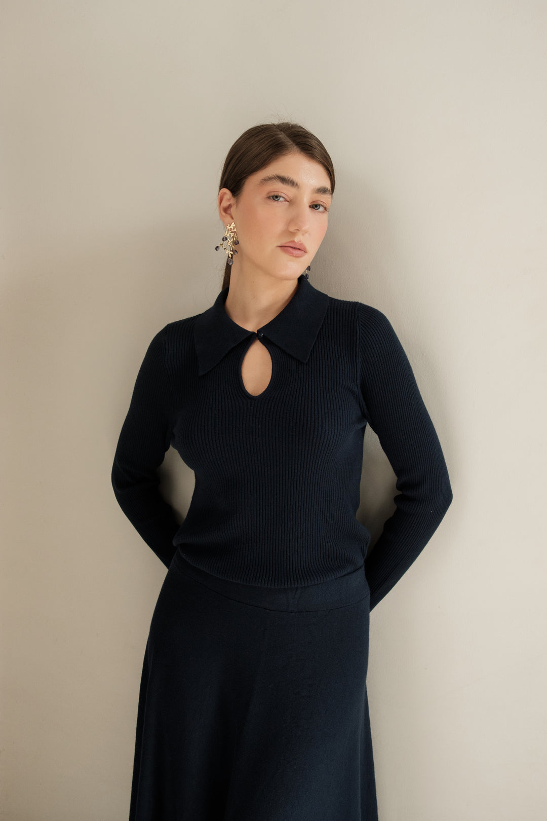 Polo donna in viscosa con scollo ovale e bottoncino