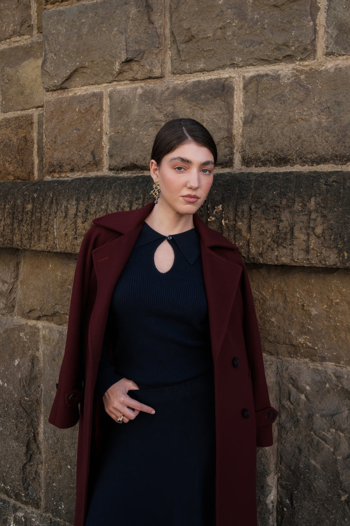 Polo donna in viscosa con scollo ovale e bottoncino